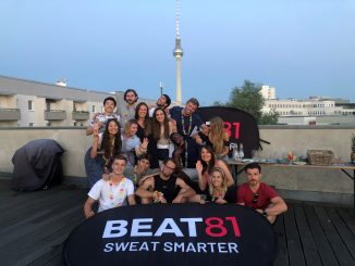 Beat81 team photo with TV tower in background
