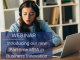 Woman sitting at laptop taking notes
