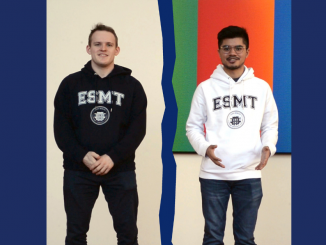 Thomas Hudson and Rashid Quddus wearing ESMT hoodies and standing beside each other with a colourful wall behind them.