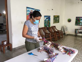 Woman making pulseras