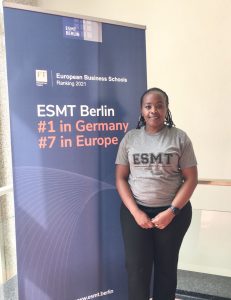 Lucy Wanjiku standing in ESMT Building
